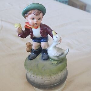 Charming Boy with Goose Figurine
